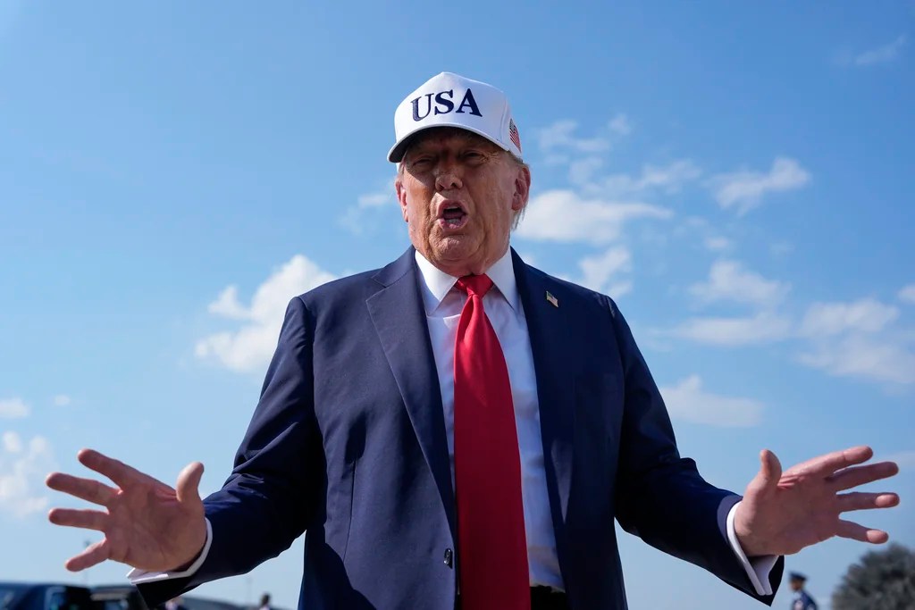 President Donald Trump talks to reporters before boarding Air Force One, Thursday, July 3, 2025, at Joint Base Andrews, Md.