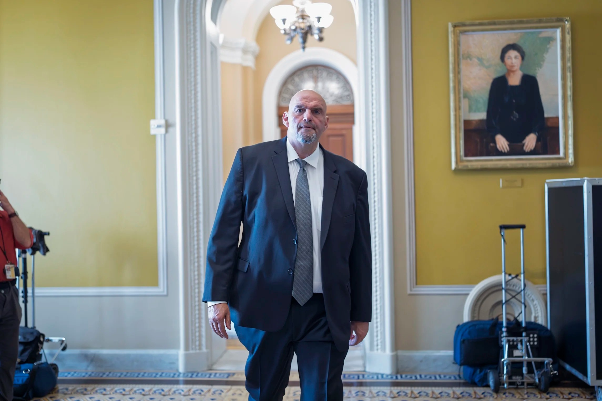 Sen. John Fetterman, D-Pa., arrives at the chamber as senators gather for an official group photo, at the Capitol in Washington, Tuesday, July 15, 2025.