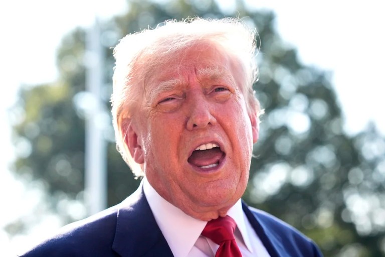 President Donald Trump speaks with reporters before departing on Marine One from the South Lawn of the White House, Friday, July 25, 2025, in Washington. The President is traveling to Scotland. (AP Photo/Alex Brandon)
