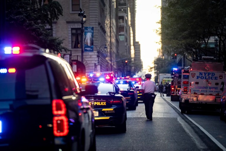 Four people killed, including officer, in Manhattan shooting with gunman dead