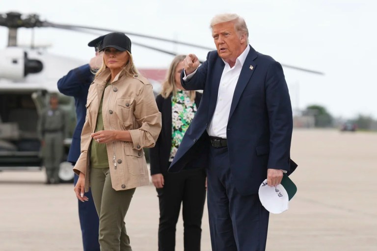 President Donald Trump, right, and first lady Melania Trump arrive at Kelly Field air base in San Antonio, Texas, en route to observe flood damage in Kerrville, Friday, July 11, 2025.