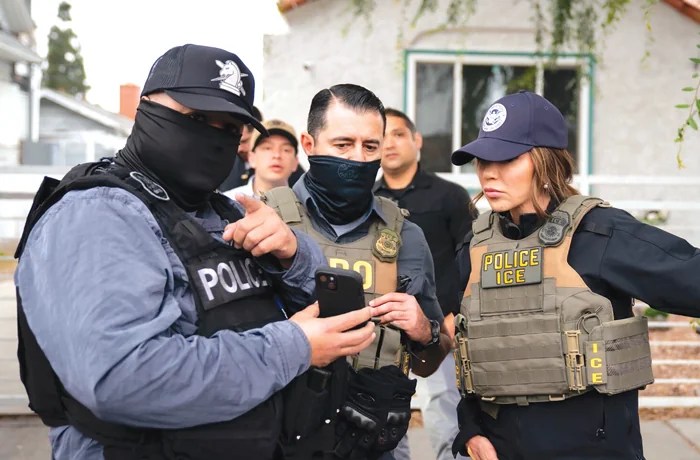 Homeland Security Secretary Kristi Noem joins federal agents during an ICE raid in Huntington Park, Los Angeles, on June 13. (US Homeland Security/Anadolu via Getty Images)