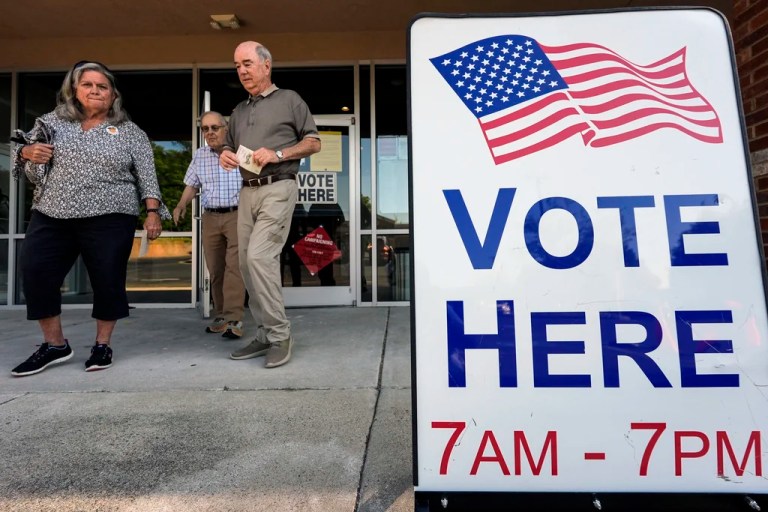 Voters depart an election center during primary voting, May 21, 2024, in Kennesaw, Georgia. Conservative groups are systematically attempting to challenge large numbers of voter registrations across the country ahead of this year's presidential election.