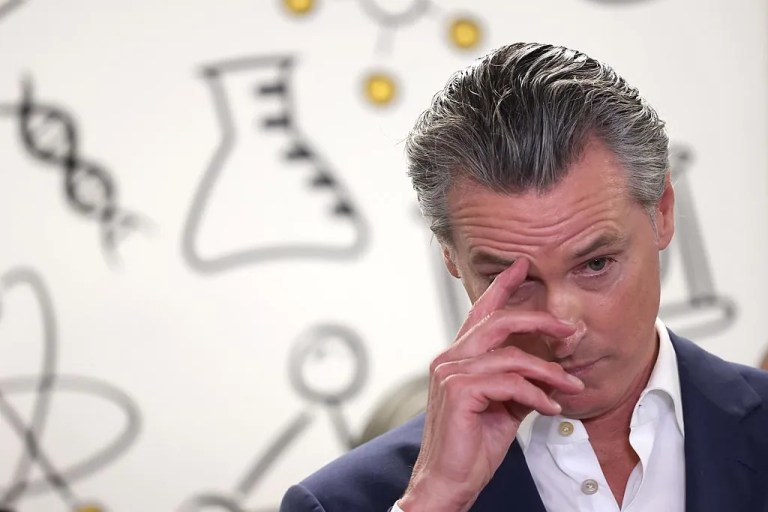 California Governor Gavin Newsom strikes a pensive pose before presenting his Golden State Literacy Plan at Clinton Elementary School in Compton on June 5, 2025. The governor was joined by State Superintendent of Public Instruction Tony Thurmond and other education officials. (Genaro Molina/Los Angeles Times via Getty Images)