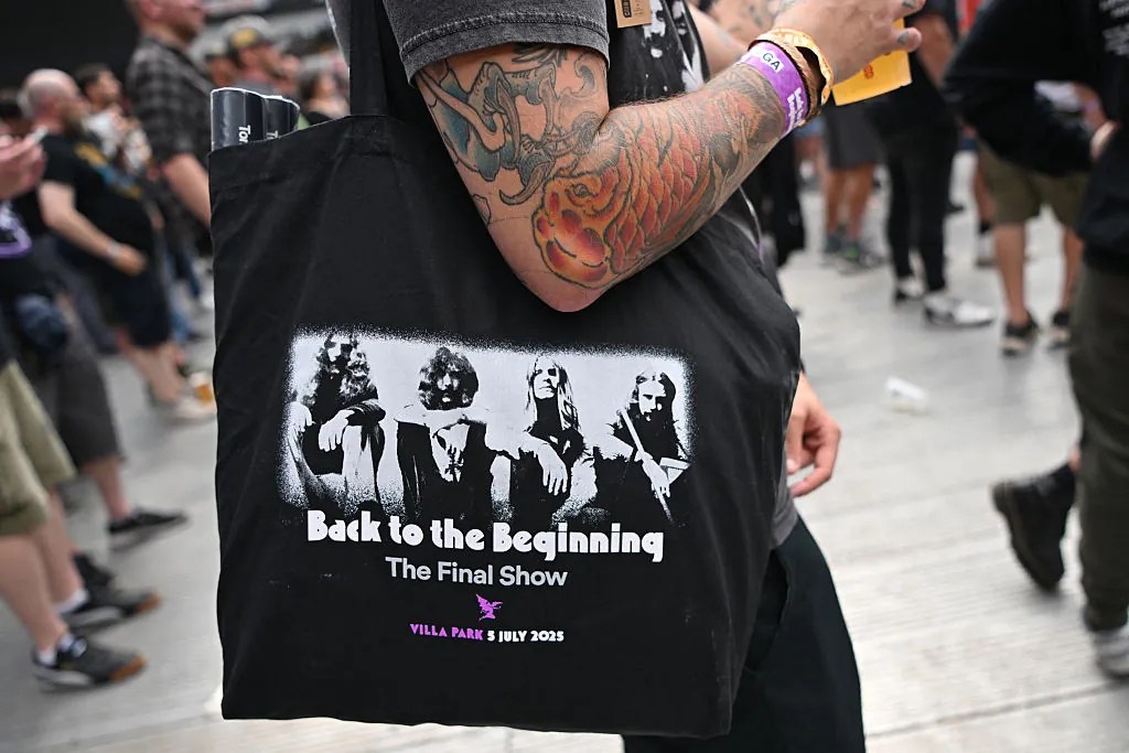 Fans watch support acts, during British rock band Black Sabbath's "Back to The Beginning" concert, Ozzy Osbourne's final ever gig as Black Sabbath's frontman at Villa Park in Birmingham, central England on July 5, 2025. Osbourne, who revealed in 2020 that he has Parkinson's disease, will join Tony Iommi, Geezer Butler and Bill Ward for the all-day "Back To The Beginning" show in Birmingham, central England, where the heavy metal giants formed in 1968. (Photo by ANDY BUCHANAN / AFP) (Photo by ANDY BUCHANAN/AFP via Getty Images)