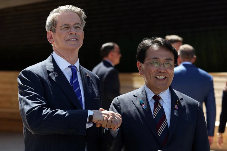 Scott Bessent, US treasury secretary, left, and Ryosei Akazawa, Japan's top tariff negotiator, in front of the US Pavilion at the Osaka Expo in Osaka, Japan, on Saturday, July 19, 2025. Japanese Prime Minister Shigeru Ishiba and Bessent indicated the two nations could reach a 