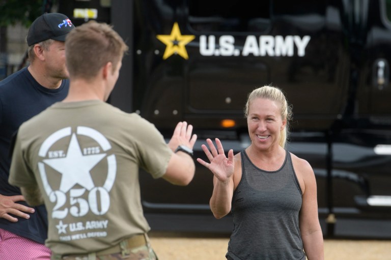 MTG offers her rifle to fight ‘nasty America last Democrats’