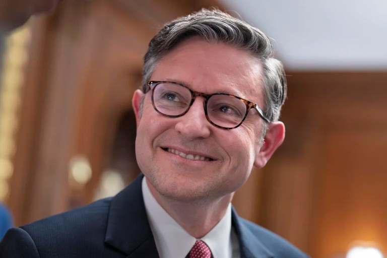 Speaker of the House Mike Johnson, R-La., smiles after giving reporters an optimistic outlook to passing President Donald Trump's big tax and immigration bill by July 4th, during a news conference at the Capitol in Washington, Tuesday, June 24, 2025. (AP Photo/J. Scott Applewhite)