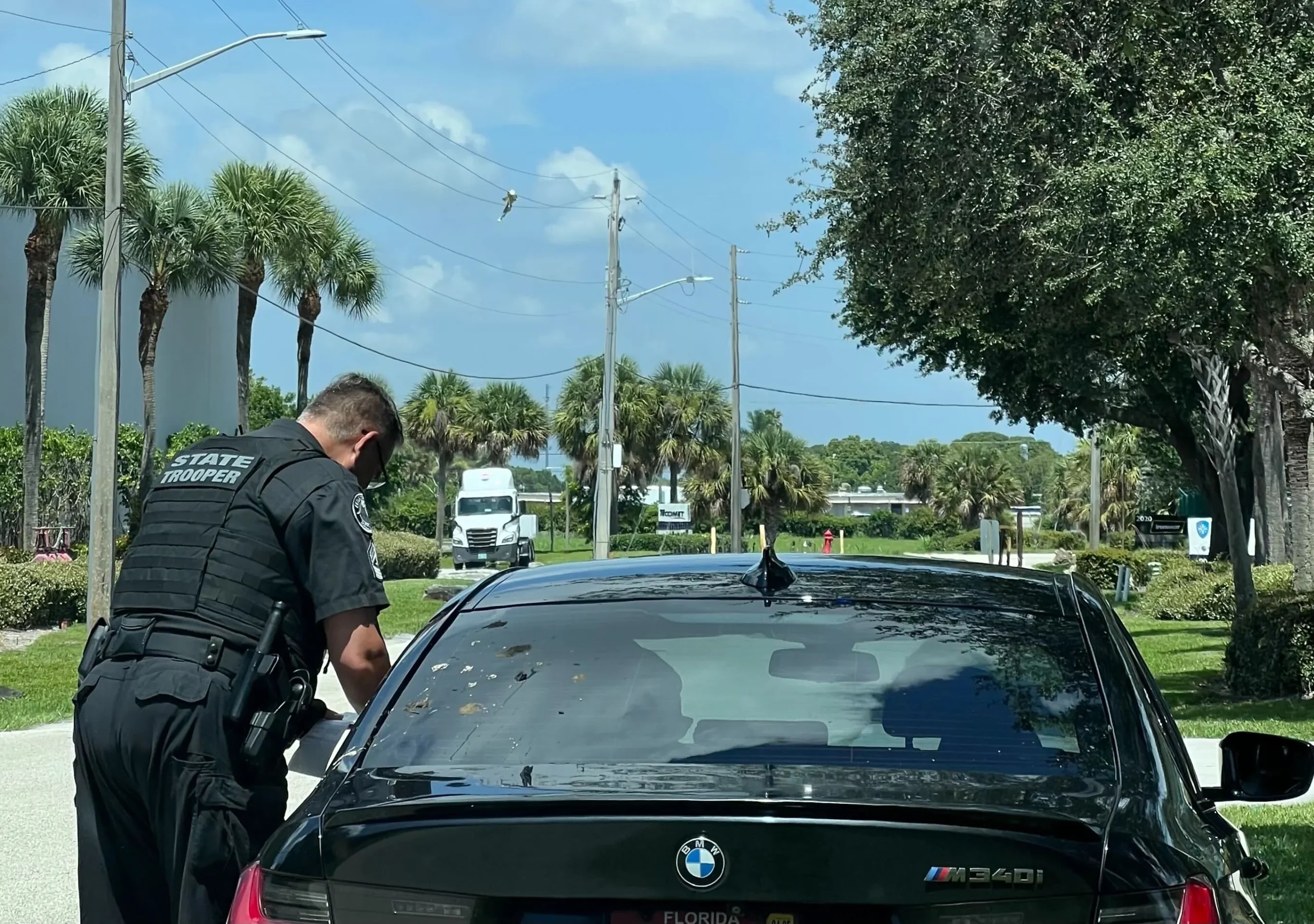 A Florida Highway Patrol state trooper asks a driver about his expired tag. (Anna Giaritelli / Washington Examiner)