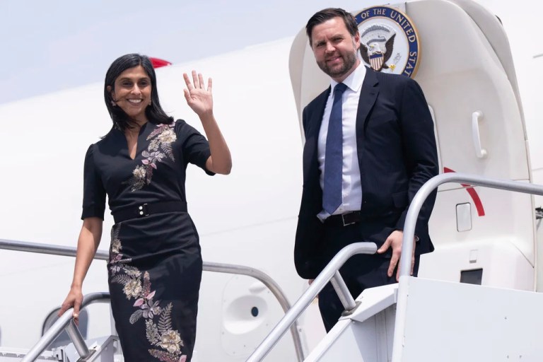 JD Vance and his wife, Usha Vance, wave during a trip to Pennsylvania aboard Air Force Two.