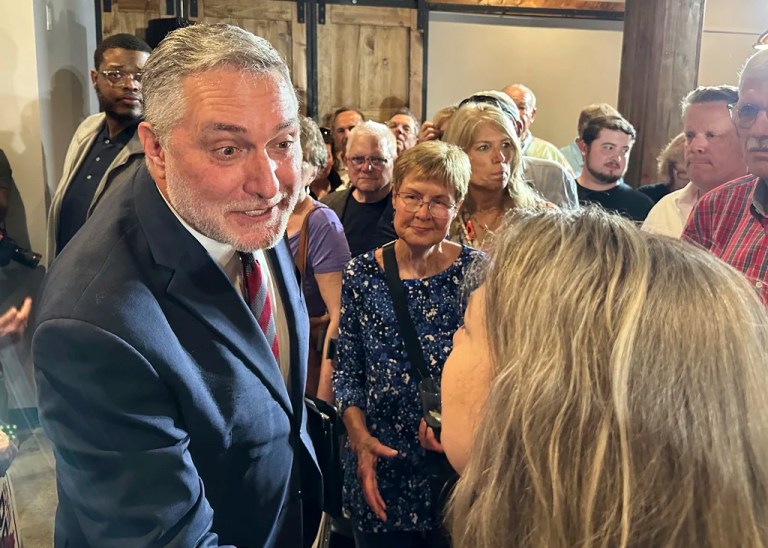 John Reid, Virginia's Republican nominee for lieutenant governor, greets supporters at his rally at Atlas 42 in Glen Allen, Va., Wednesday, April 30, 2025.