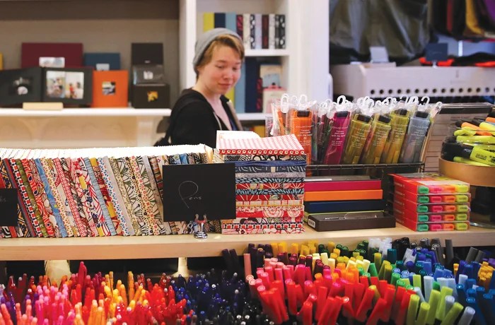 A customer browses the stationary displayed at Itoya Topdrawer in Boston. (Craig F. Walker/The Boston Globe via Getty Images)