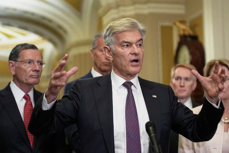 Center for Medicare and Medicaid Services Administrator Dr. Mehmet Oz, center, talks after a policy luncheon on Capitol Hill, Tuesday, June. 17, 2025, in Washington.