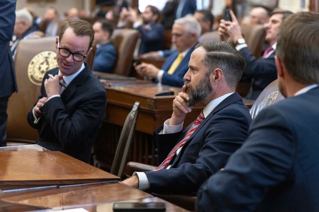 Texas state Rep. Dustin Burrows, R-Lubbock, right, waits results in the speaker race with former Speaker Dade Phelan, R-Beaumont, during opening day of the 89th Texas Legislative Session in Austin, Texas, Tuesday, Jan. 14, 2025.