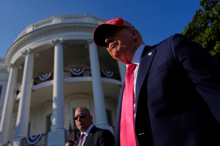 President Donald Trump walks to greet guests after he signed his signature bill of tax breaks and spending cuts at the White House, Friday, July 4, 2025, in Washington.