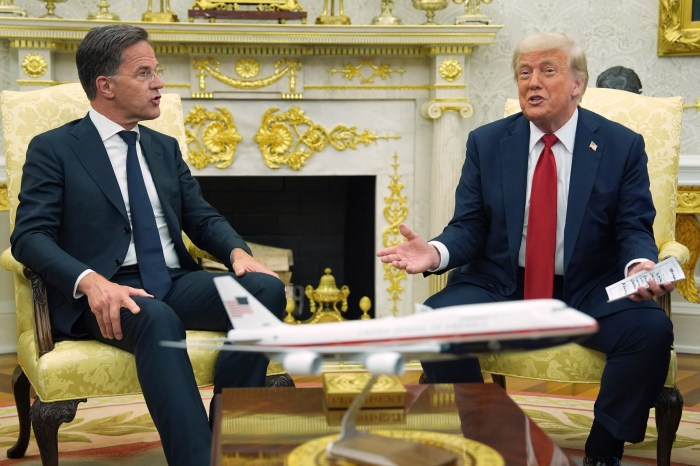 NATO Secretary General Mark Rutte speaks as President Donald Trump listens during a meeting in the Oval Office of the White House, Monday, July 14, 2025, in Washington.