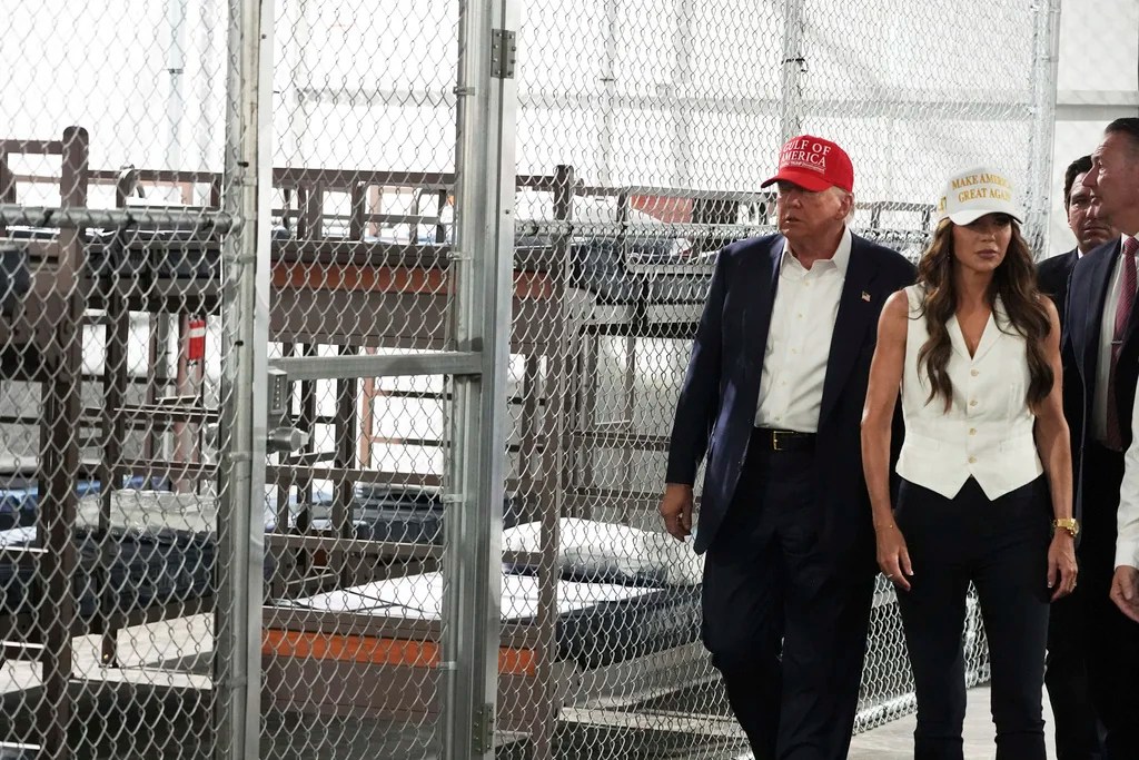 President Donald Trump, Gov. Ron DeSantis, R-Fla., Homeland Security Secretary Kristi Noem and others, tour "Alligator Alcatraz," a new migrant detention facility at Dade-Collier Training and Transition facility, Tuesday, July 1, 2025, in Ochopee, Fla. (AP Photo/Evan Vucci)