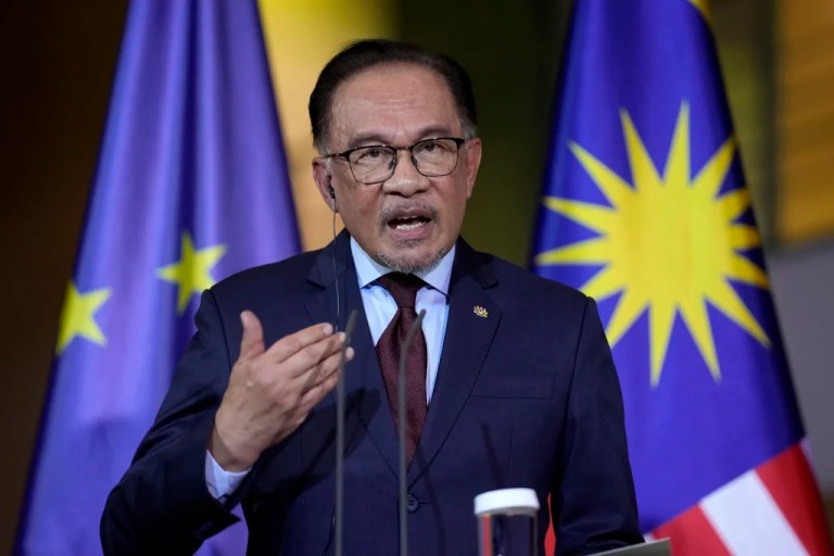 Malaysian Prime Minister Anwar Ibrahim speaks during a joint press conference with German Chancellor Olaf Scholz in the chancellory in Berlin, Monday, March 11, 2024.