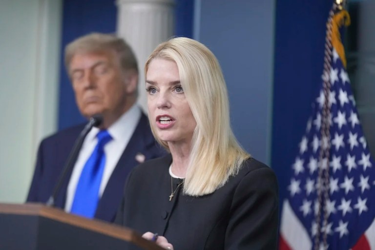Attorney General Pam Bondi speaks to the media, Friday, June 27, 2025, in the briefing room of the White House in Washington, as President Donald Trump looks on.