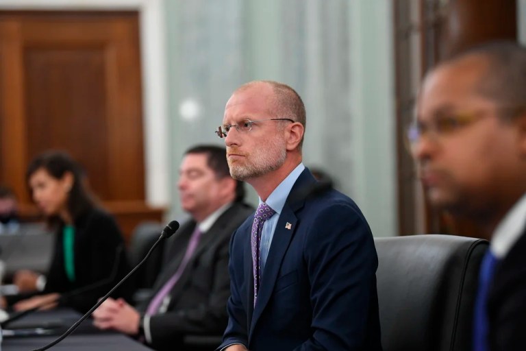 Brendan Carr listens during a Senate Commerce, Science, and Transportation committee hearing to examine the Federal Communications Commission on Capitol Hill in Washington, June 24, 2020.