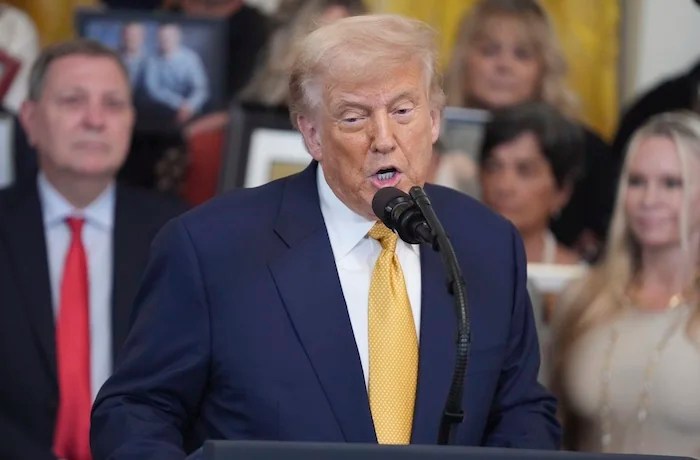 President Donald Trump speaks during a ceremony to sign the 