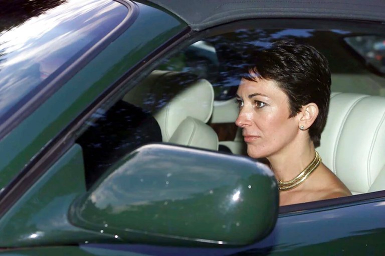 In this Sept. 2, 2000 file photo, British socialite Ghislaine Maxwell, driven by Britain's Prince Andrew leaves the wedding of a former girlfriend of the prince, Aurelia Cecil, at the Parish Church of St Michael in Compton Chamberlayne near Salisbury, England. The FBI said Thursday July 2, 2020, Ghislaine Maxwell, who was accused by many women of helping procure underage sex partners for Jeffrey Epstein, has been arrested in New Hampshire.