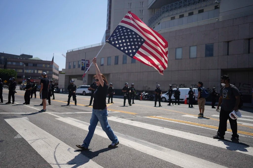 Protesters gather outside the federal building to denounce the ICE, U.S. Immigration and Customs Enforcement, operations in the area Tuesday, June 10, 2025, in downtown Los Angeles.