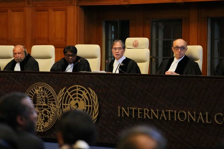 Presiding judge Yuji Iwasawa, second from right, speaks at a hearing to deliver an advisory opinion on what legal obligations nations have to address climate change and what consequences they may face if they don't, Wednesday, July 23, 2025, in The Hague, Netherlands.