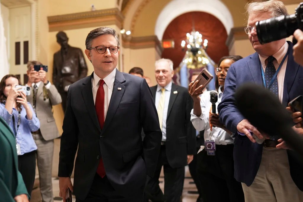 Speaker of the House Mike Johnson, R-La., with House Majority Leader Steve Scalise, R-La., speaks to reporters as he heads to the chamber, at the Capitol in Washington, Wednesday, July 2, 2025.