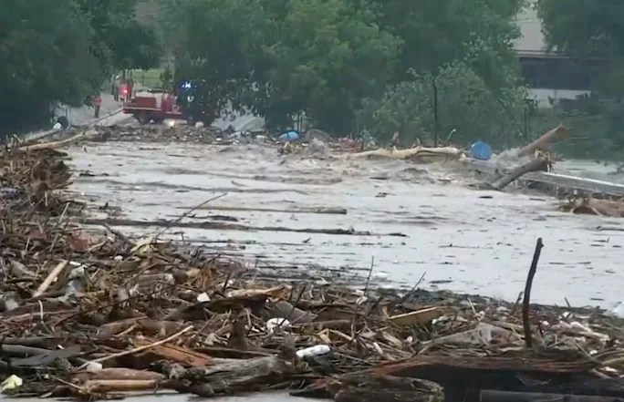 Water rises from severe flooding along the Guadalupe River in Kerr County, Texas on Friday, July 4, 2025.