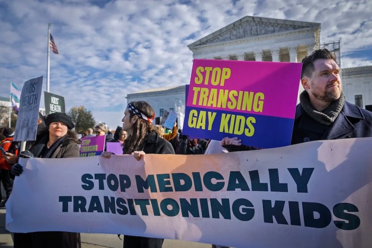 Ben Appel, of New York, right, who describes himself as a gay man who is concerned that gender nonconformity is being medicalized, rallies with others who support a Tennessee law banning gender-affirming medical care for transgender youth, Wednesday, Dec. 4, 2024, outside the Supreme Court in Washington. (AP Photo/Jacquelyn Martin)