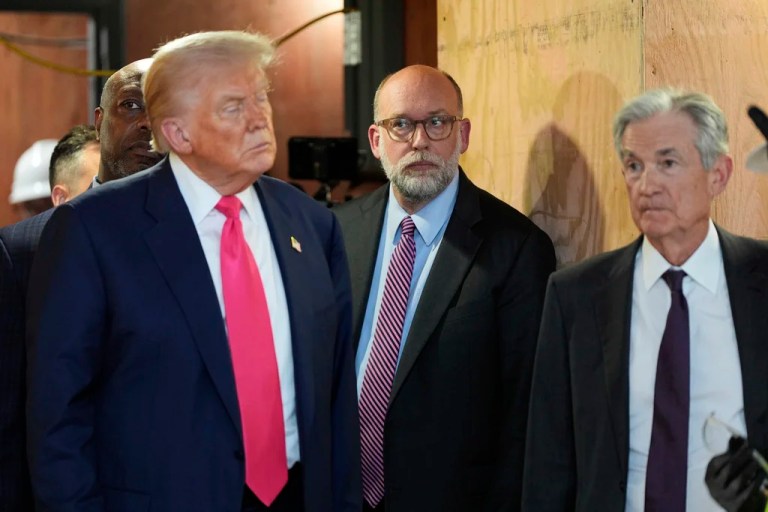 Russell Vought, director of the Office of Management and Budget, center, with President Donald Trump, left and Federal Reserve Chairman Jerome Powell, visit the Federal Reserve, Thursday, July 24, 2025, in Washington.