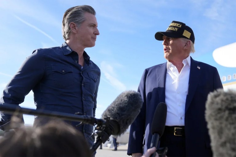 President Donald Trump talks with California Gov. Gavin Newsom (D) after arriving on Air Force One at Los Angeles International Airport in Los Angeles, Friday, Jan. 24, 2025.