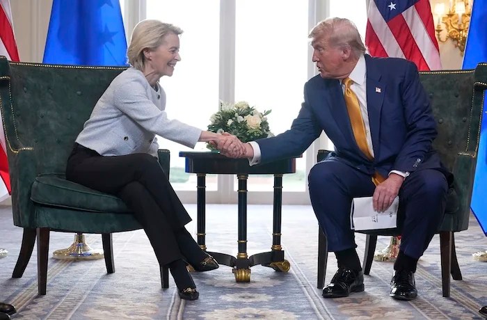 President Donald Trump and European Commission President Ursula von der Leyen shake hands after reaching a trade deal at the Trump Turnberry golf course in Turnberry, Scotland