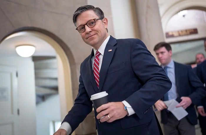 Speaker of the House Mike Johnson, R-La., heads to the chamber for the final votes of the week, as President Donald Trump's sweeping domestic policy bill lingers in the Senate, awaiting concensus from divided Republicans, at the Capitol in Washington, Friday, June 27, 2025