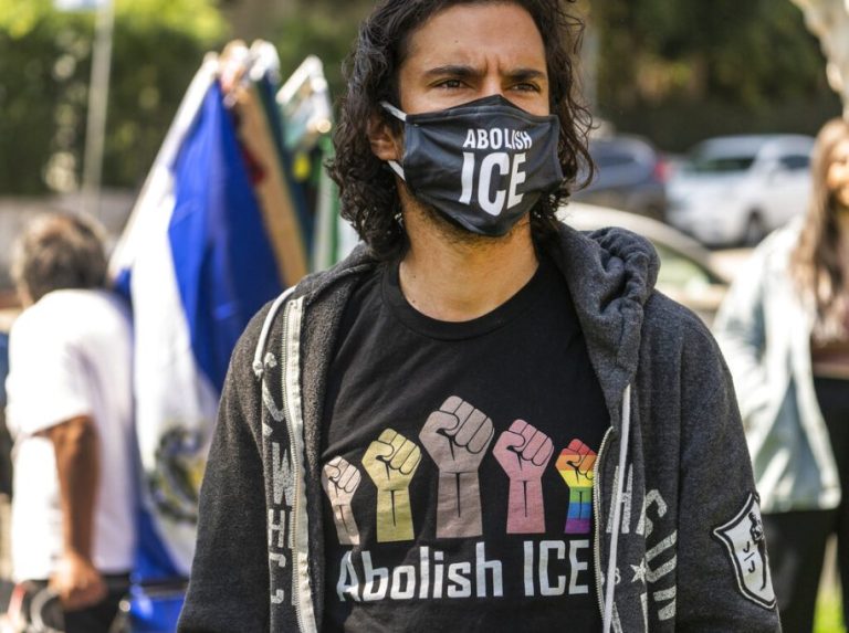 Activist Adam de Monet wears an 