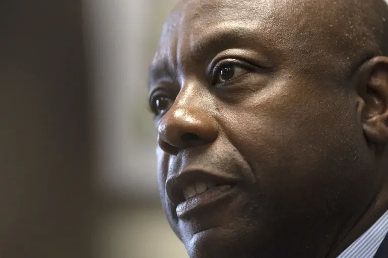Sen. Tim Scott, R-S.C, speaks with reporters after signing papers to get on the Republican presidential primary ballot at the New Hampshire Statehouse, Friday, Oct. 20, 2023, in Concord, N.H.