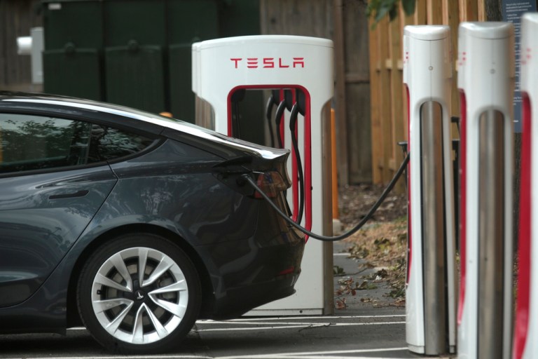 A Tesla supercharging location is seen on Kipling Street, June 3, 2024 in Houston.