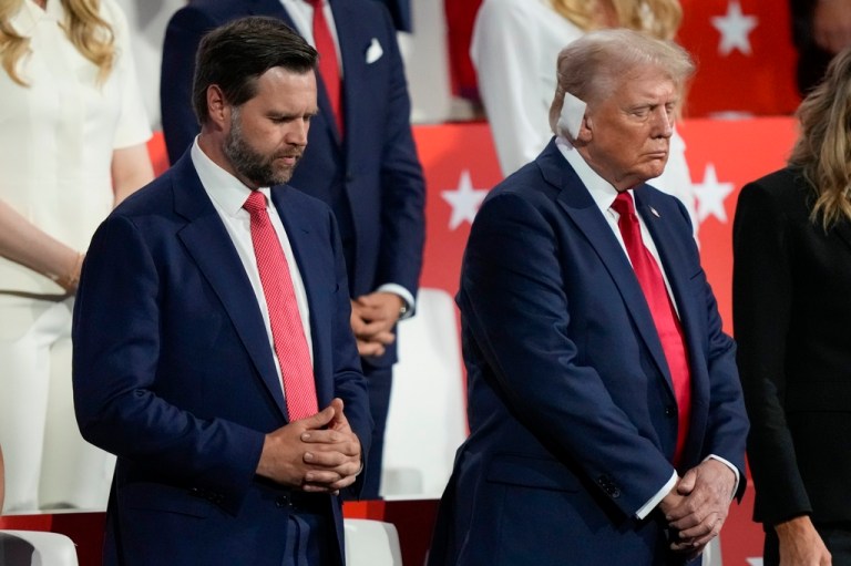 Former President Donald Trump, Republican presidential candidate, and Sen. JD Vance (R-OH), Republican vice presidential candidate, pray during the Republican National Convention, Thursday, July 18, 2024, in Milwaukee.
