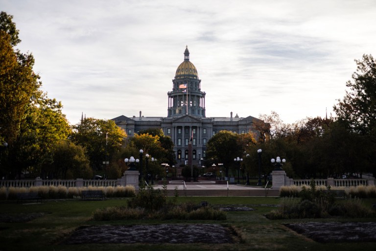 The sun rises behind the Colorado State Capitol in Denver on Election Day, Tuesday, Nov. 5, 2024.