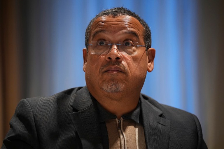 Minnesota Attorney General Keith Ellison pauses during an interview with the Associated Press.