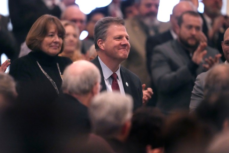 Former New Hampshire Gov. Chris Sununu is recognized by Republican Kelly Ayotte during her inauguration at the State House, Thursday, Jan. 9, 2025, in Concord, New Hampshire.