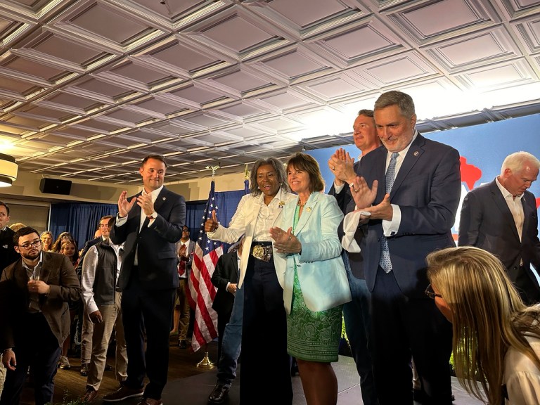 Jason Miyares, Winsome Earle-Sears, Delores Oates, Glenn Youngkin and John Reid gather at a campaign rally in Vienna, Va, on Tuesday, July 1, 2025.