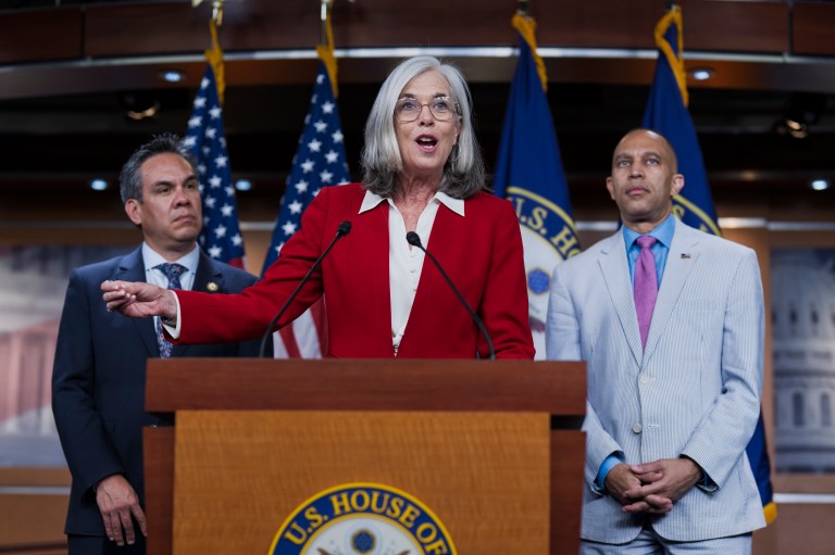 Rep. Katherine Clark (D-MA) center, the House minority whip, flanked by Rep. Pete Aguilar (D-CA), left, chairman of the House Democratic Caucus, and House Minority Leader Hakeem Jeffries (D-NY) talks to reporters about the decision by Speaker Mike Johnson (R-LA) to leave Washington early as Republicans clash over the Jeffrey Epstein files, at the Capitol, Wednesday, July 23, 2025.