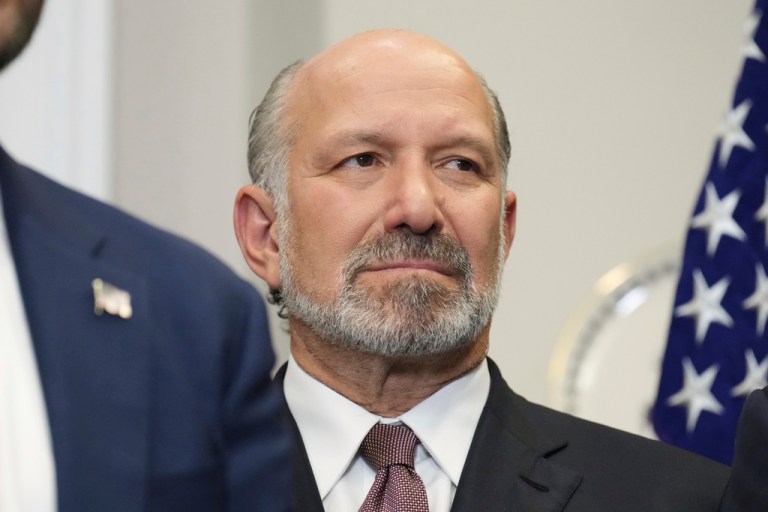 Commerce Secretary Howard Lutnick listens as President Donald Trump speaks during an event to sign an executive order restarting the Presidential Fitness Test in public schools, Thursday, July 31, 2025, in the Roosevelt Room of the White House in Washington.
