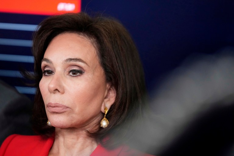 U.S. Attorney Jeanine Pirro listens as President Donald Trump speaks with reporters in the James Brady Press Briefing Room at the White House, Monday, Aug. 11, 2025, in Washington.