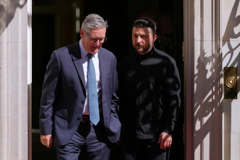 British Prime Minister Keir Starmer, left, walks out with Ukrainian President Volodymyr Zelenskyy after a meeting at Downing Street in London, Thursday, Aug. 14, 2025.