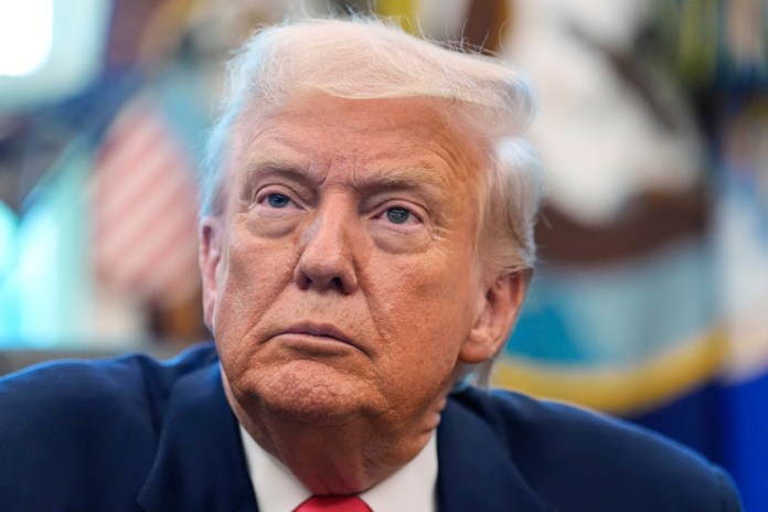 President Donald Trump listens during an event in the Oval Office to mark the 90th anniversary of the Social Security Act, Thursday, Aug. 14, 2025, in Washington. (AP Photo/Alex Brandon)