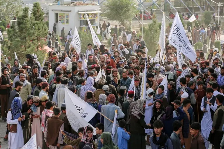 Afghans gather for a celebrations marking the fourth anniversary of the U.S. withdrawal and the start of Taliban rule in Kabul, Afghanistan, Friday, Aug. 15, 2025.