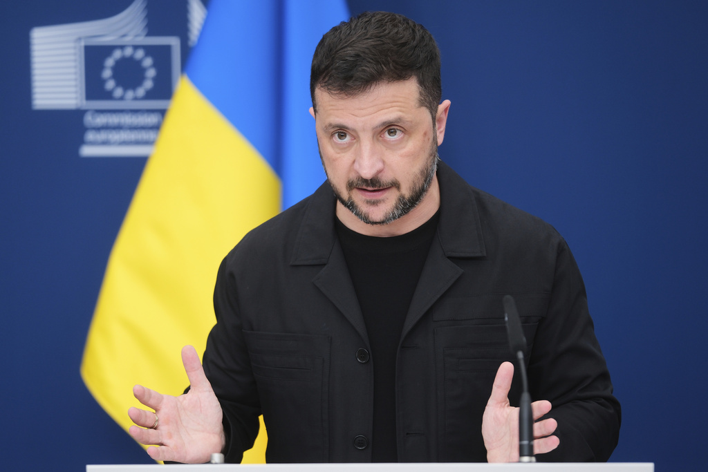 Ukraine's President Volodymyr Zelensky speaks during a media conference at EU headquarters in Brussels, Belgium, Sunday, Aug. 17, 2025. (AP Photo)